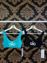 Load image into Gallery viewer, Alo Yoga XS Ambient Logo Bra - Bright Aqua/White
