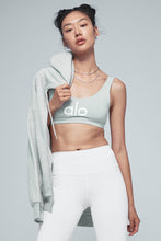 Load image into Gallery viewer, Alo Yoga SMALL Ambient Logo Bra - Athletic Heather Grey/White
