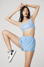 Load image into Gallery viewer, Alo Yoga XS Ambient Logo Bra - Tile Blue/White
