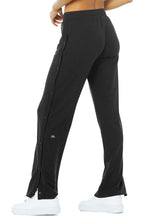 Load image into Gallery viewer, Alo Yoga SMALL Courtside Tearaway Snap Pant - Black
